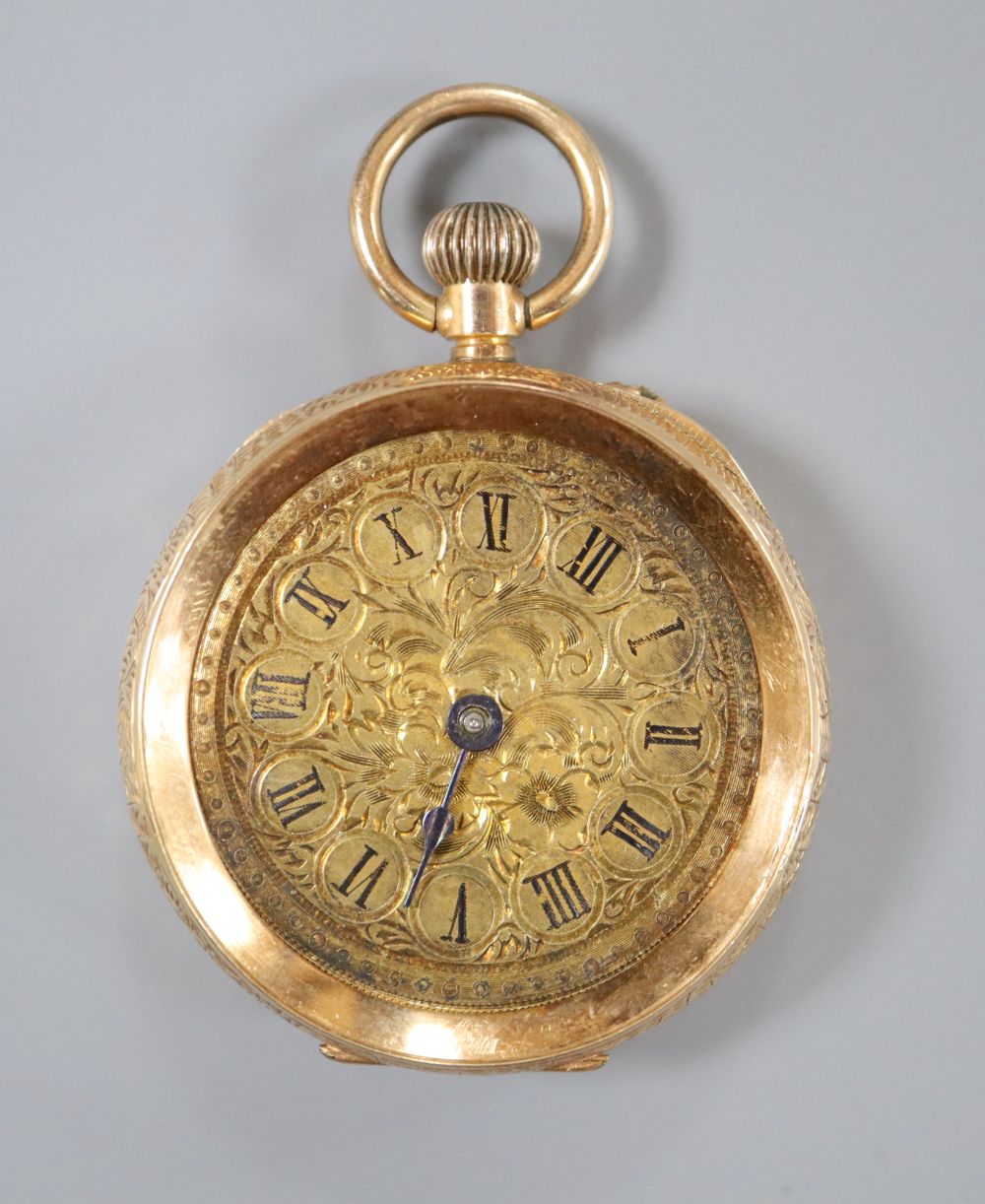 An early 20th century engraved 14k open face fob watch,